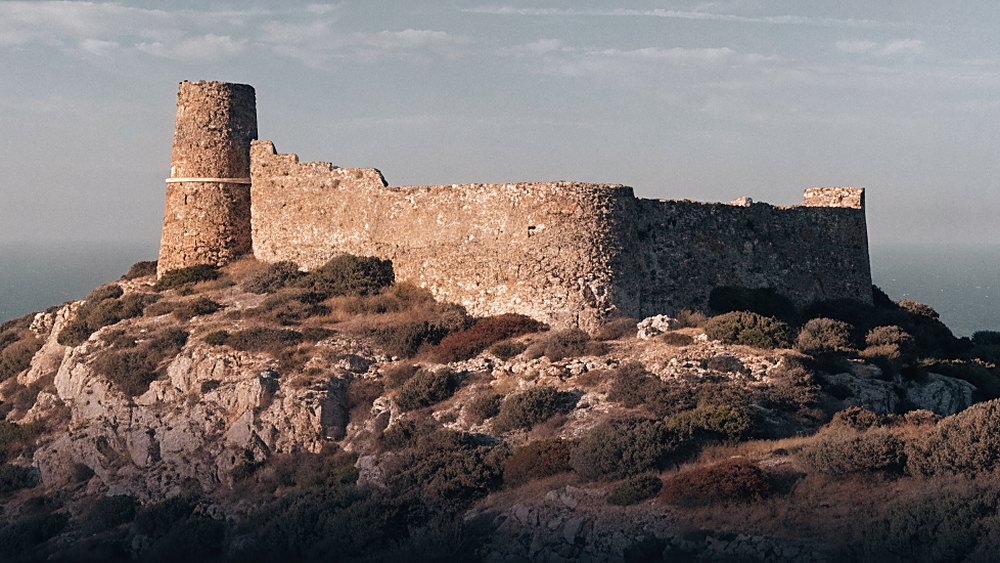 Remains of a stone fortress on a headland